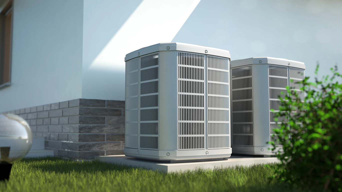 2 air conditioning units outside of home