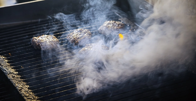 Smoking hot grill.