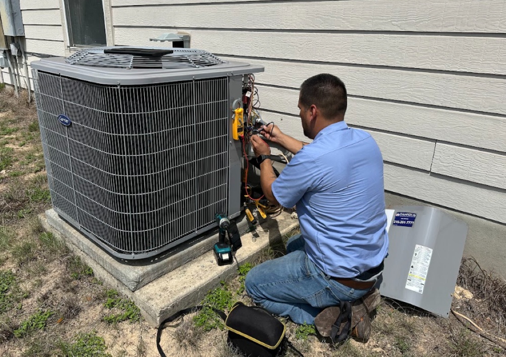Tech working on an AC system