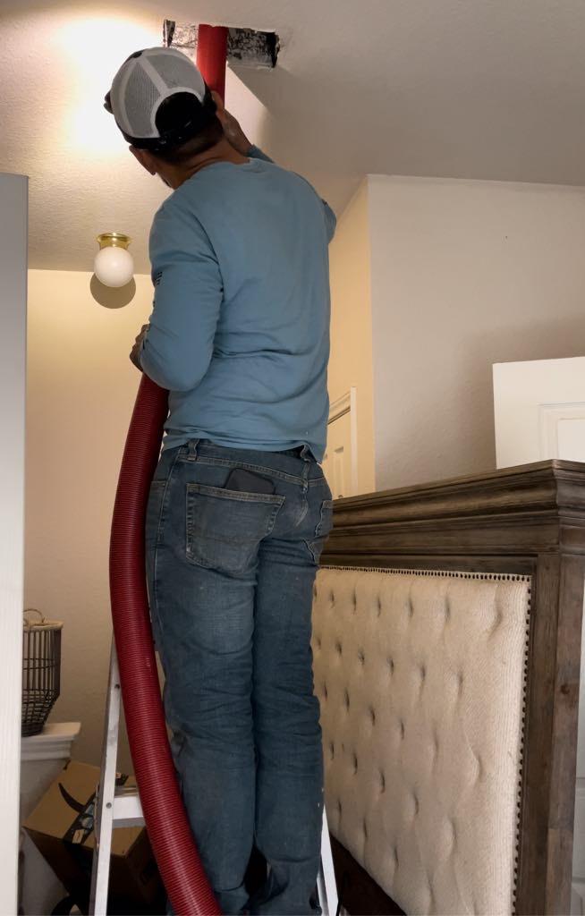 ASV technician installing HVAC.