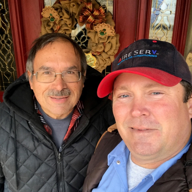 Aire Serv Employee with customer