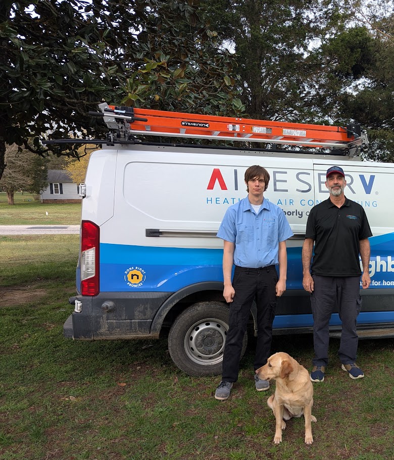 Aire Serv in Front of a Van with a Dog