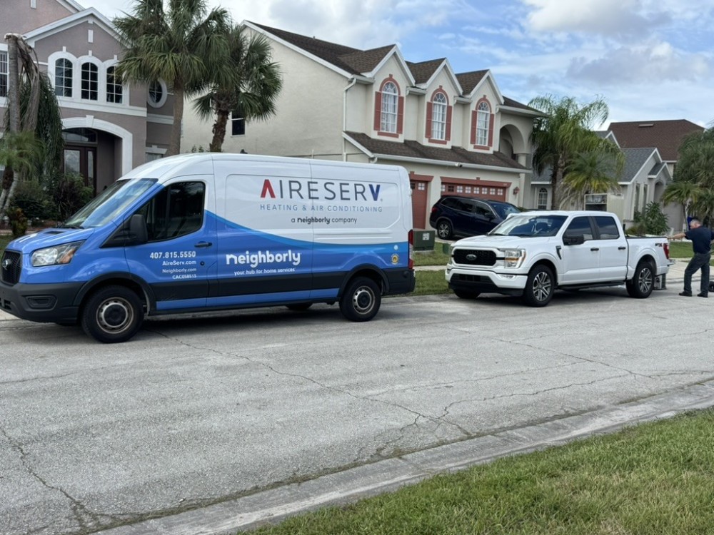 Van parked outside of a customers home.