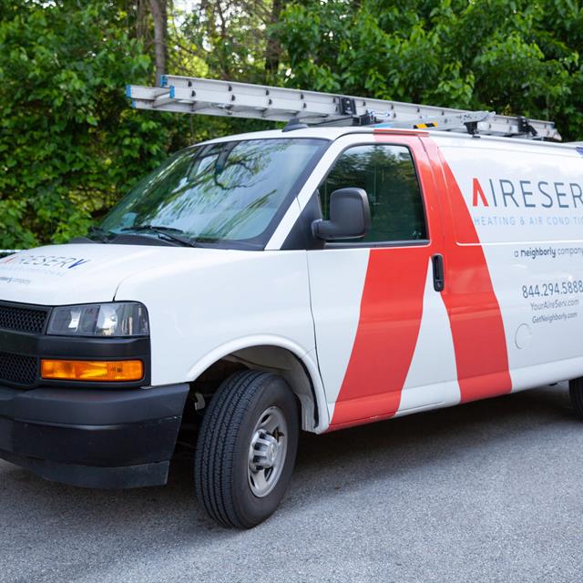 Aire Serv Van with Ladder on top