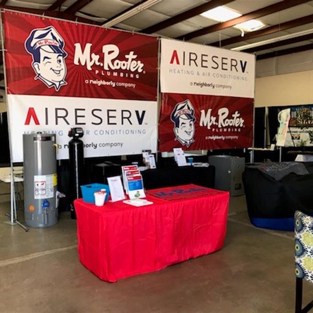 Aire Serve and Mr. Rooter booth