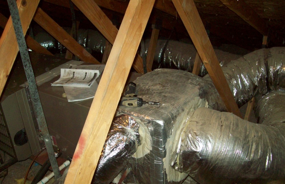 HVAC ductwork and system installed in an attic space.