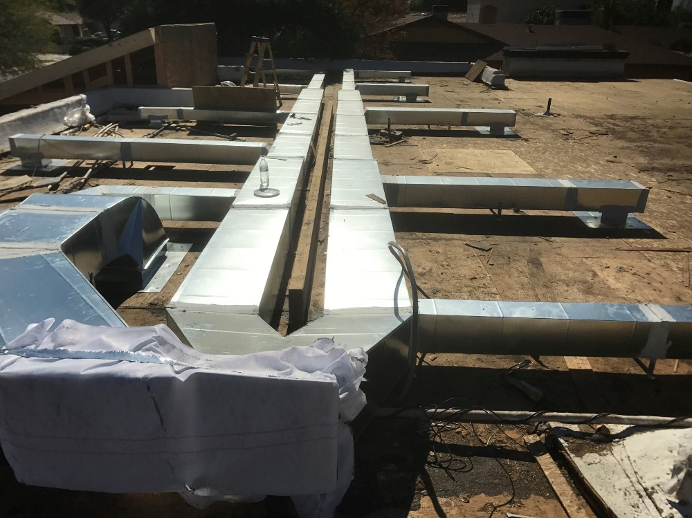 HVAC ductwork installed on the rooftop of a commercial building