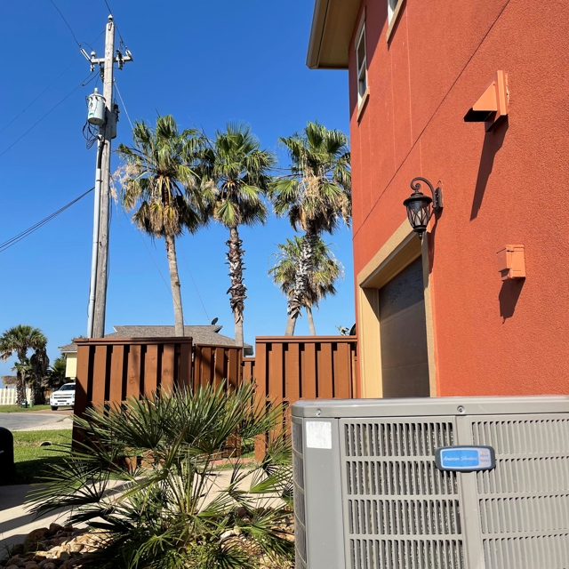 Air conditioner unit installed outside a home in Texas, serviced by Aire Serv of Coastal Bend.