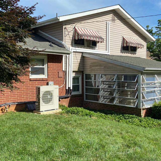 Ductless air handler installed outside a home