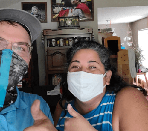 Home Owner and Aire Serv team giving the thumbs up