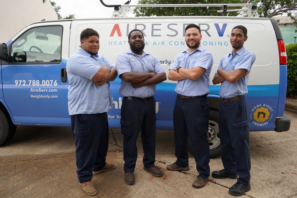 HVAC team in front of van