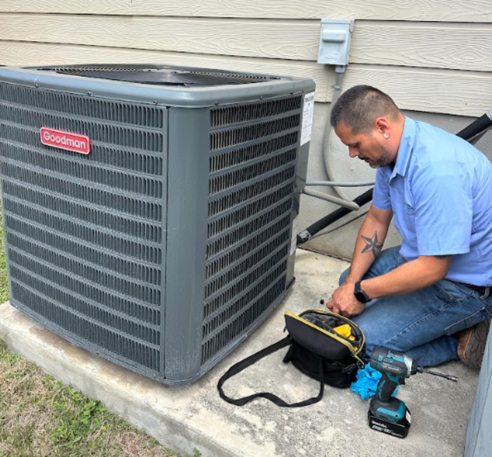 Tech working on a Goodman system