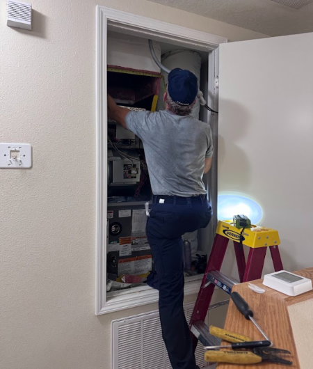 Technician working on Residential unit
