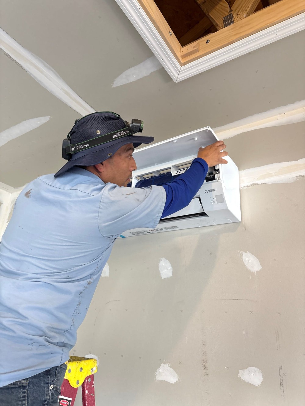 Installer Working On A Mini Split