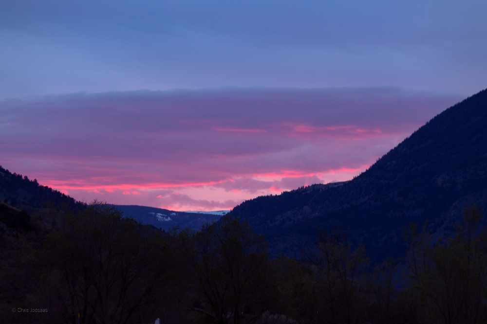 Photo of mountain scape with purple and blue skies