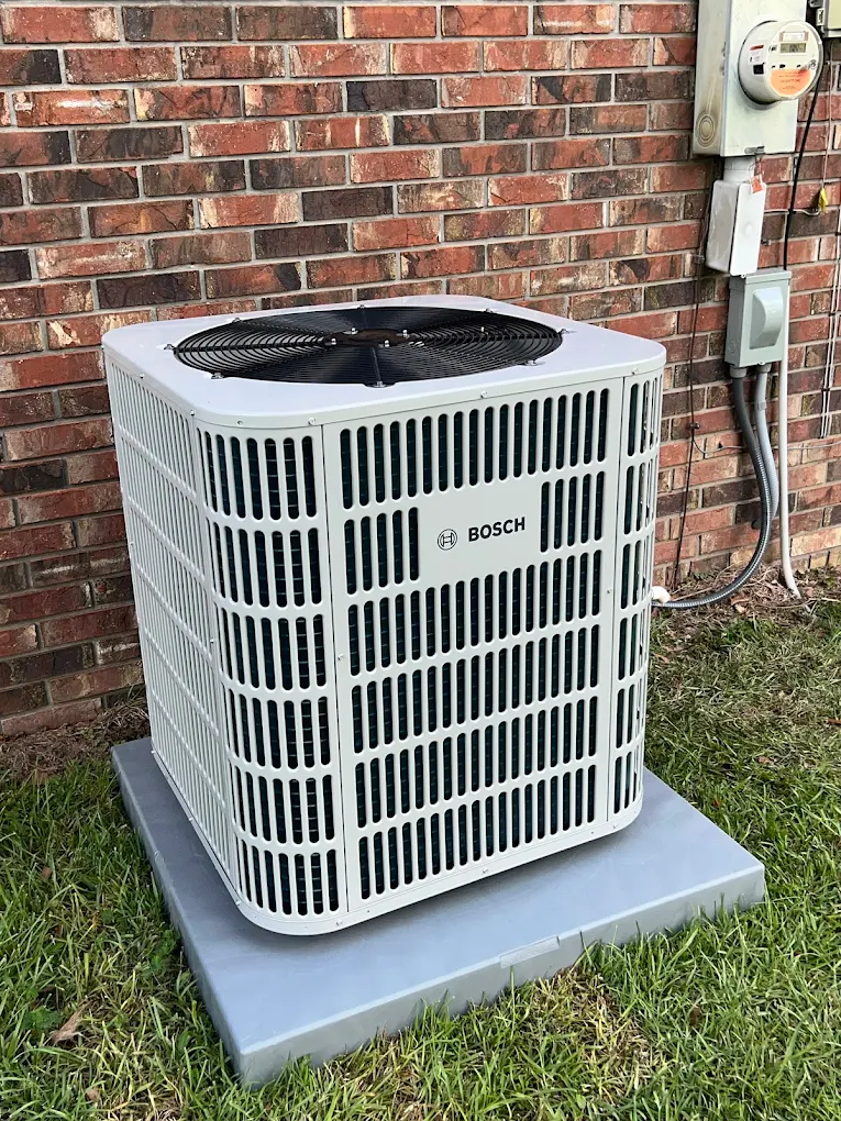 Newly Installed Heat Pump Outside A Home