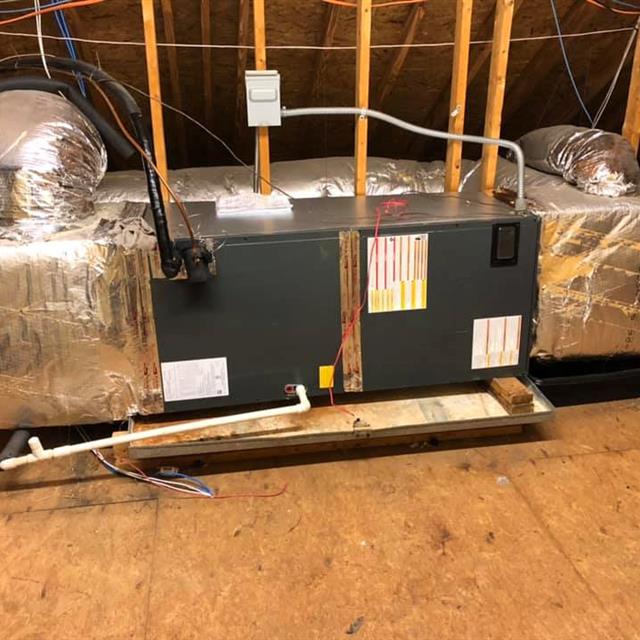 Heating And Cooling System Installed In An Attic