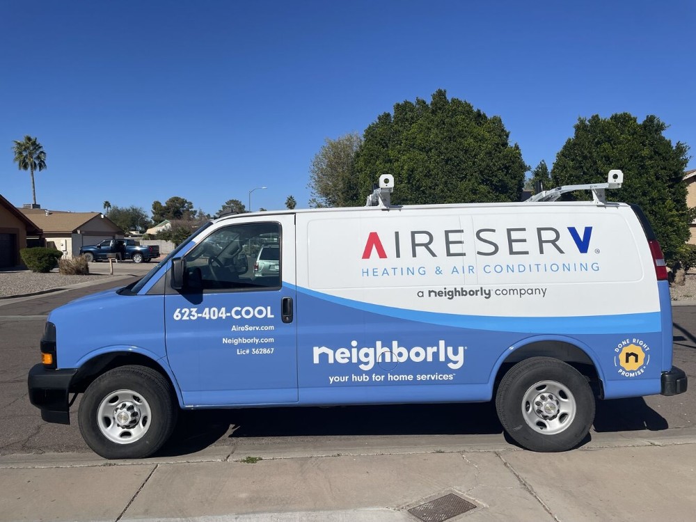 Aire Serv of E Glendale-Peoria service van featuring the 623-404-COOL phone number, parked on a residential street.