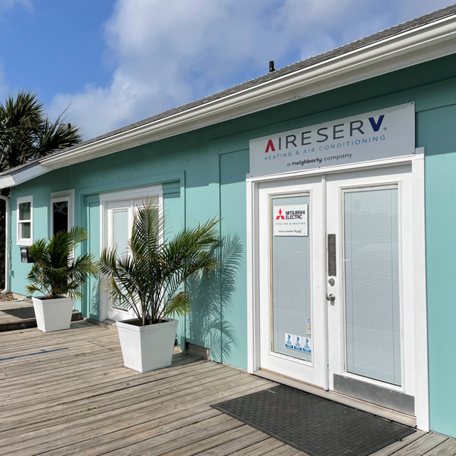 Outside Office Building With Aire Serv Logo Displayed