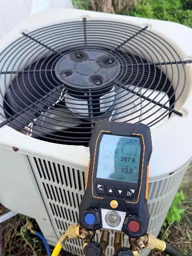 Refrigerant scanner connected to residential AC unit outside