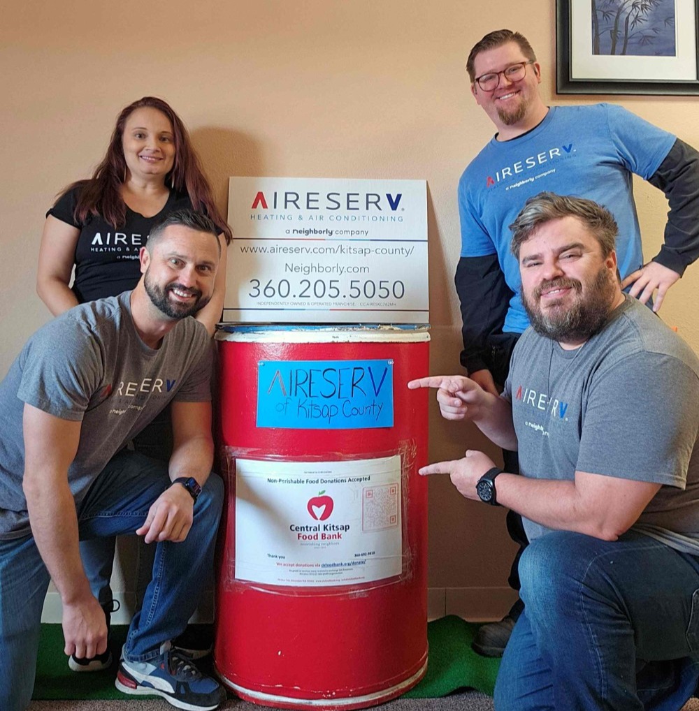 Team supporting out local food drive.