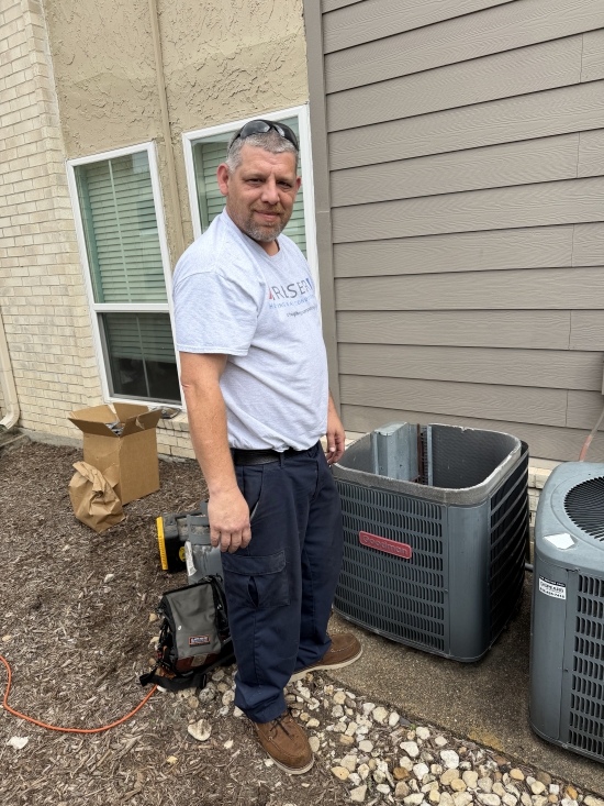 Technician Doing a Tune-Up For a Residential Home