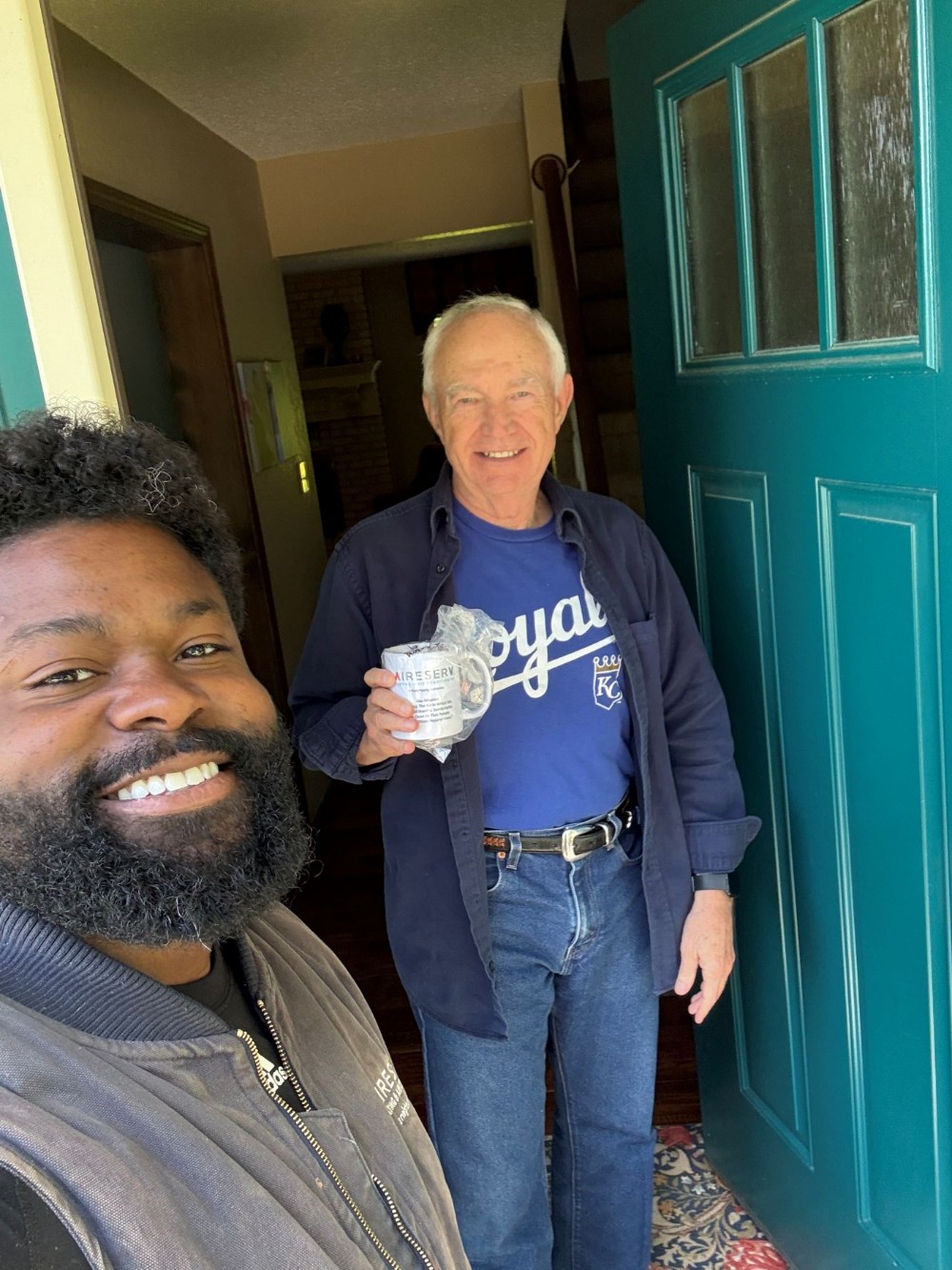 Aire Serv of ColumbiaTechnician & Happy Customer Smiling