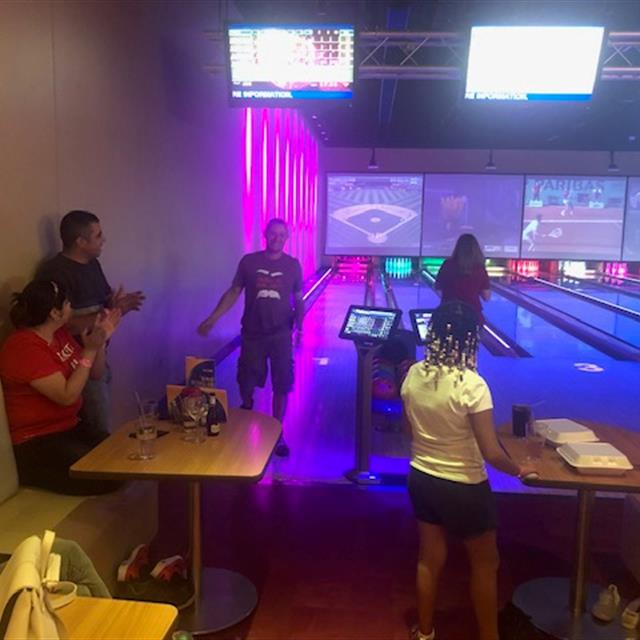 people at bowling alley