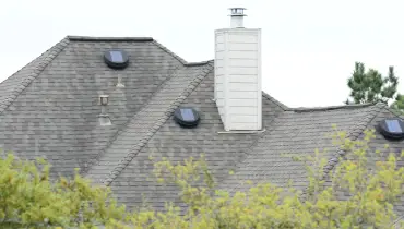 Solar-powered attic vents on house | Aire Serv of Birmingham.