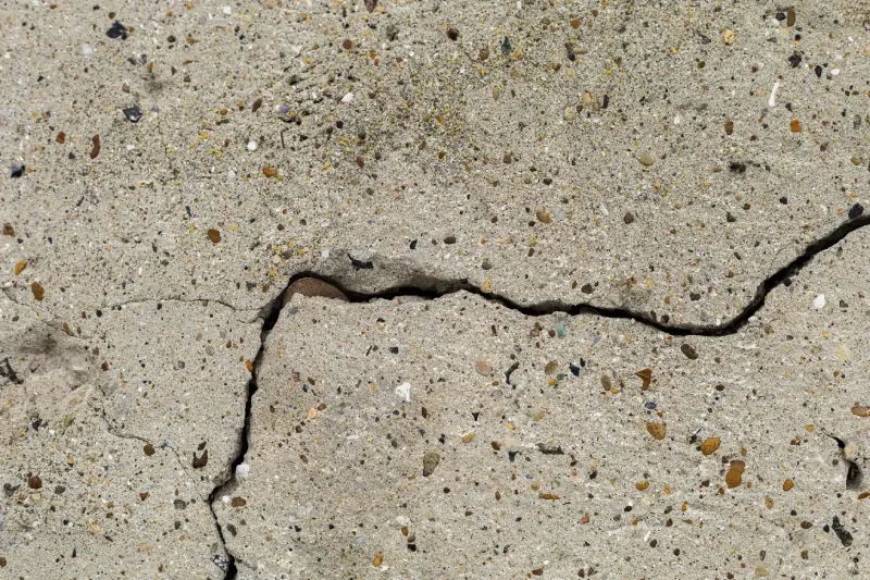 Close-up of crack in stone wall.