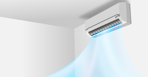 Wall-mounted AC system blowing cool air in a residential home.