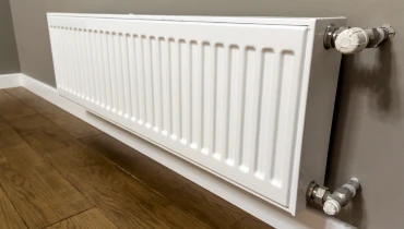 Electric heater mounted on wall