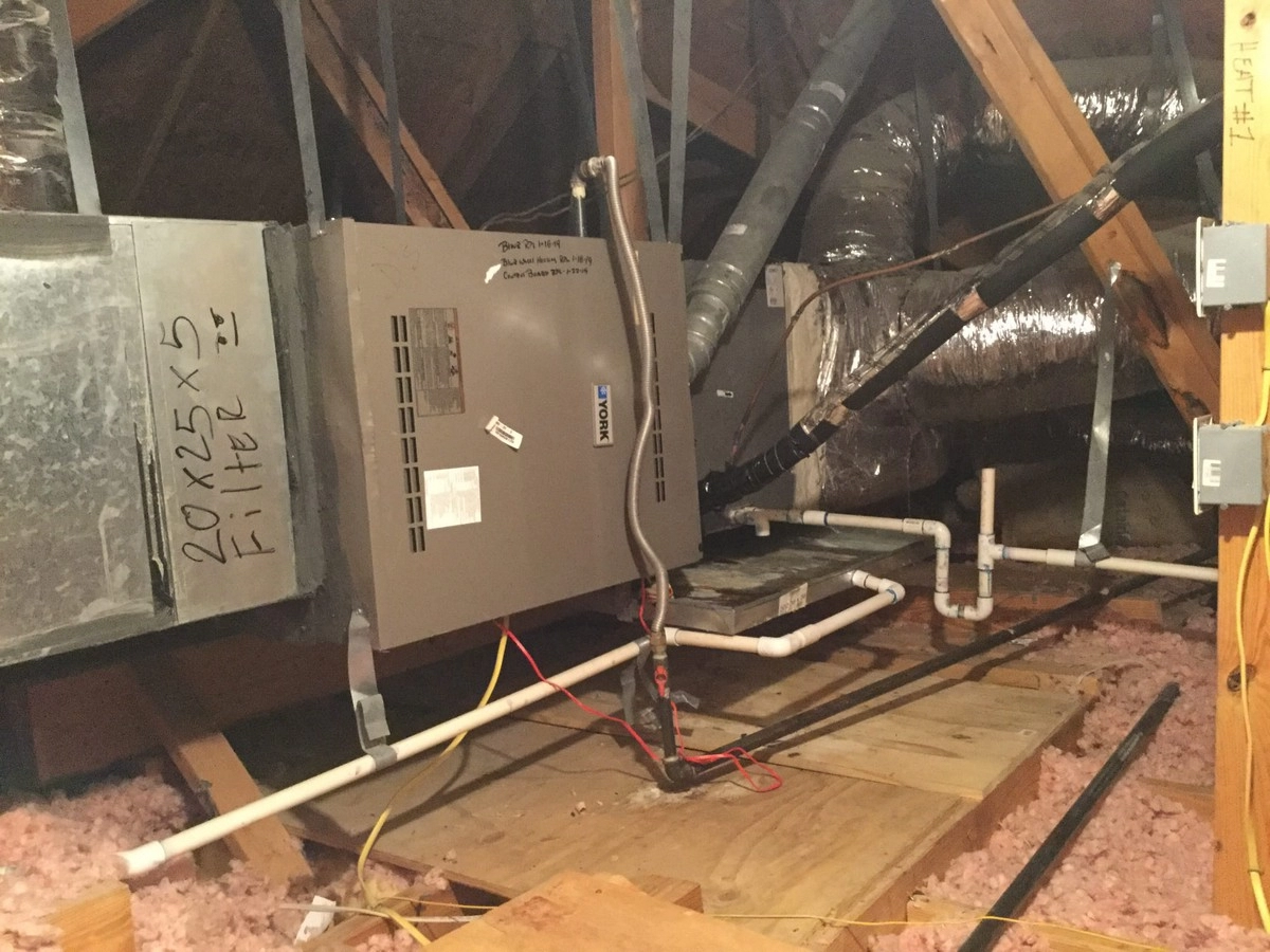 A heating system in the attic of a home receiving service for HVAC in New Hope.