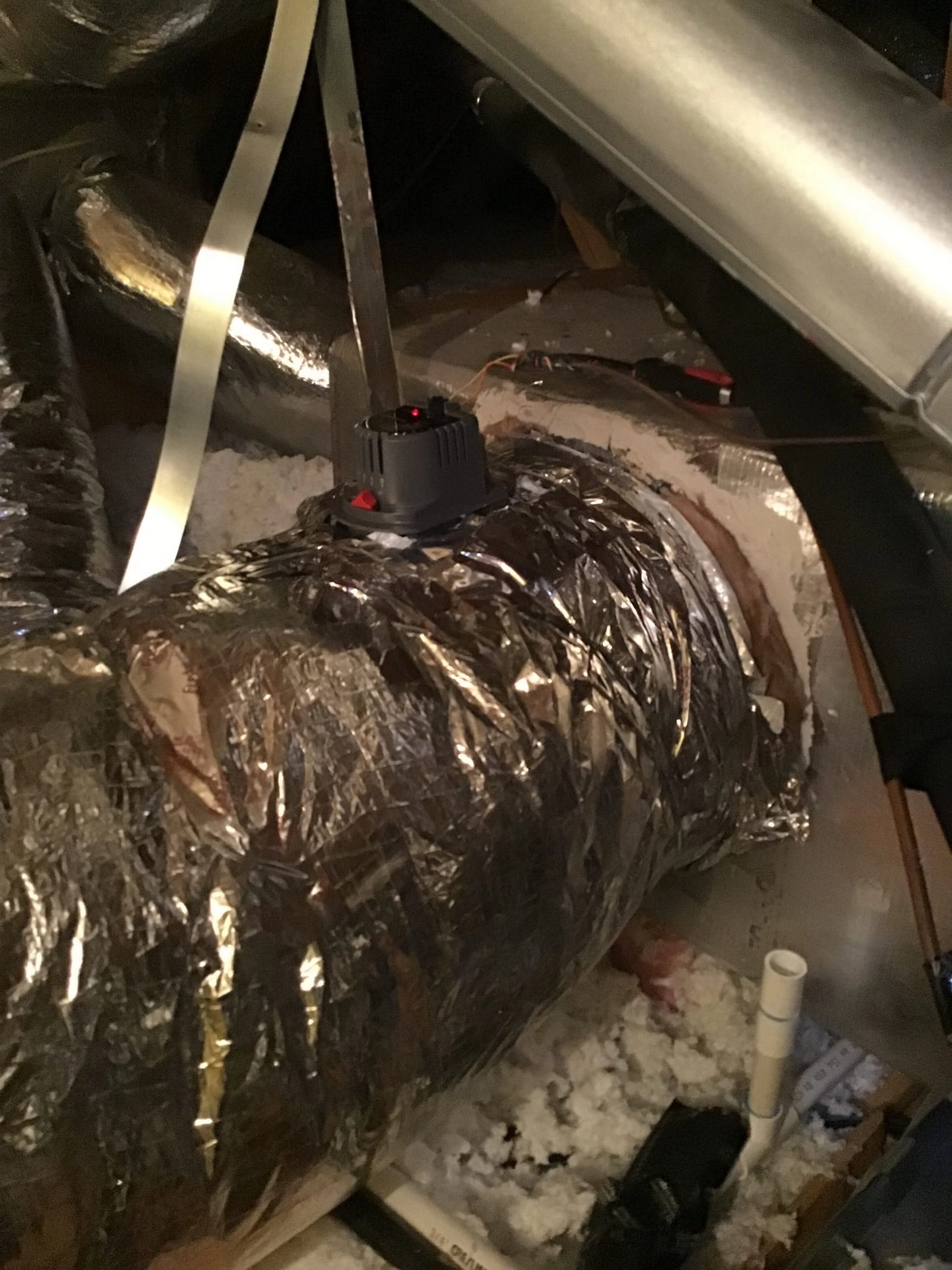 A section of ductwork made up of tubing used to distribute hot air through the rest of a ventilation system.