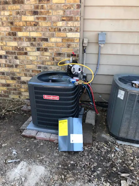 Recently replaced air conditioning condenser outside of McKinney home.