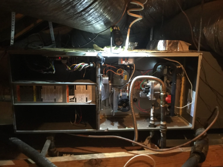  Furnace in residential home in Lavon, TX undergoing furnace repairs by HVAC Professionals.